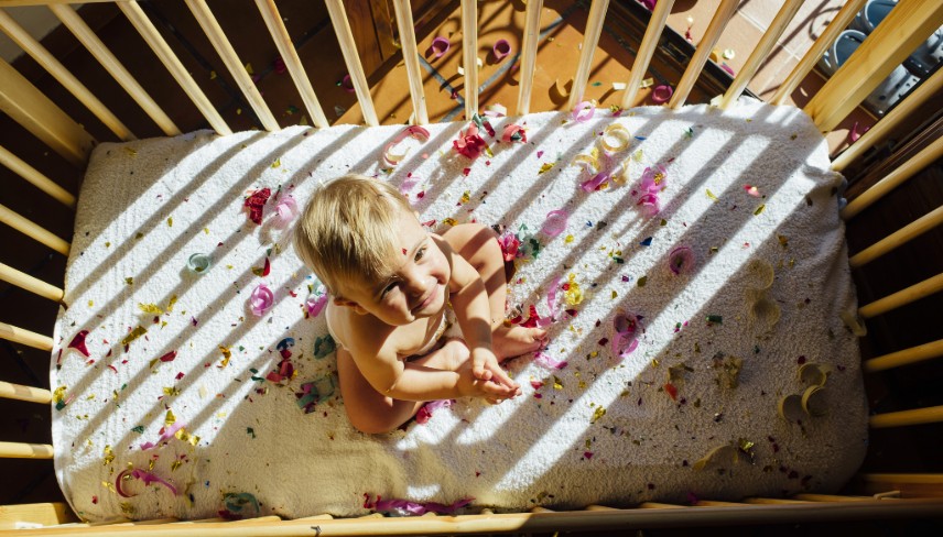 baby lying in crib